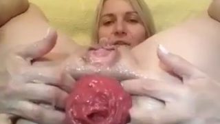 Sindy Rose buries a dildo in the ass