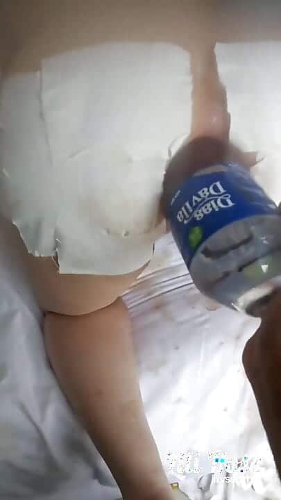 Lilianal inserting a 1.5L bottle inside the ass